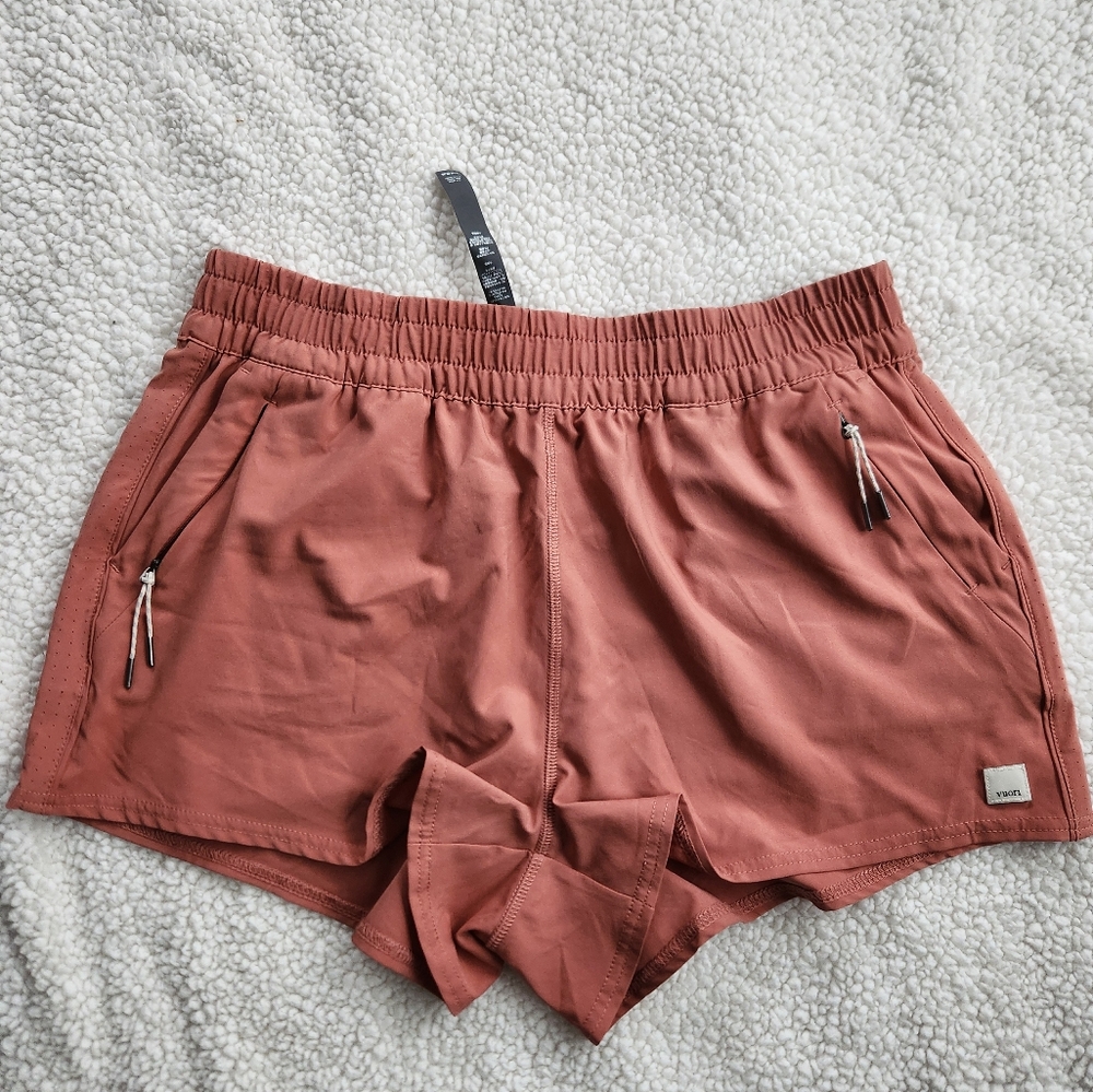 Vuori Make a run for it in these sweat-ready shorts covered in a versati…